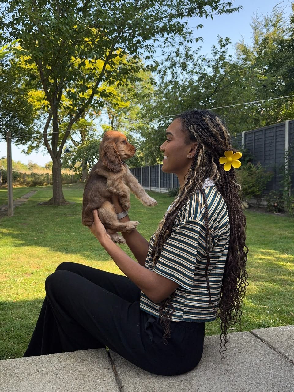 Laura Mitchell with her Cocker Spaniel puppy Daisy in Columbus, Ohio