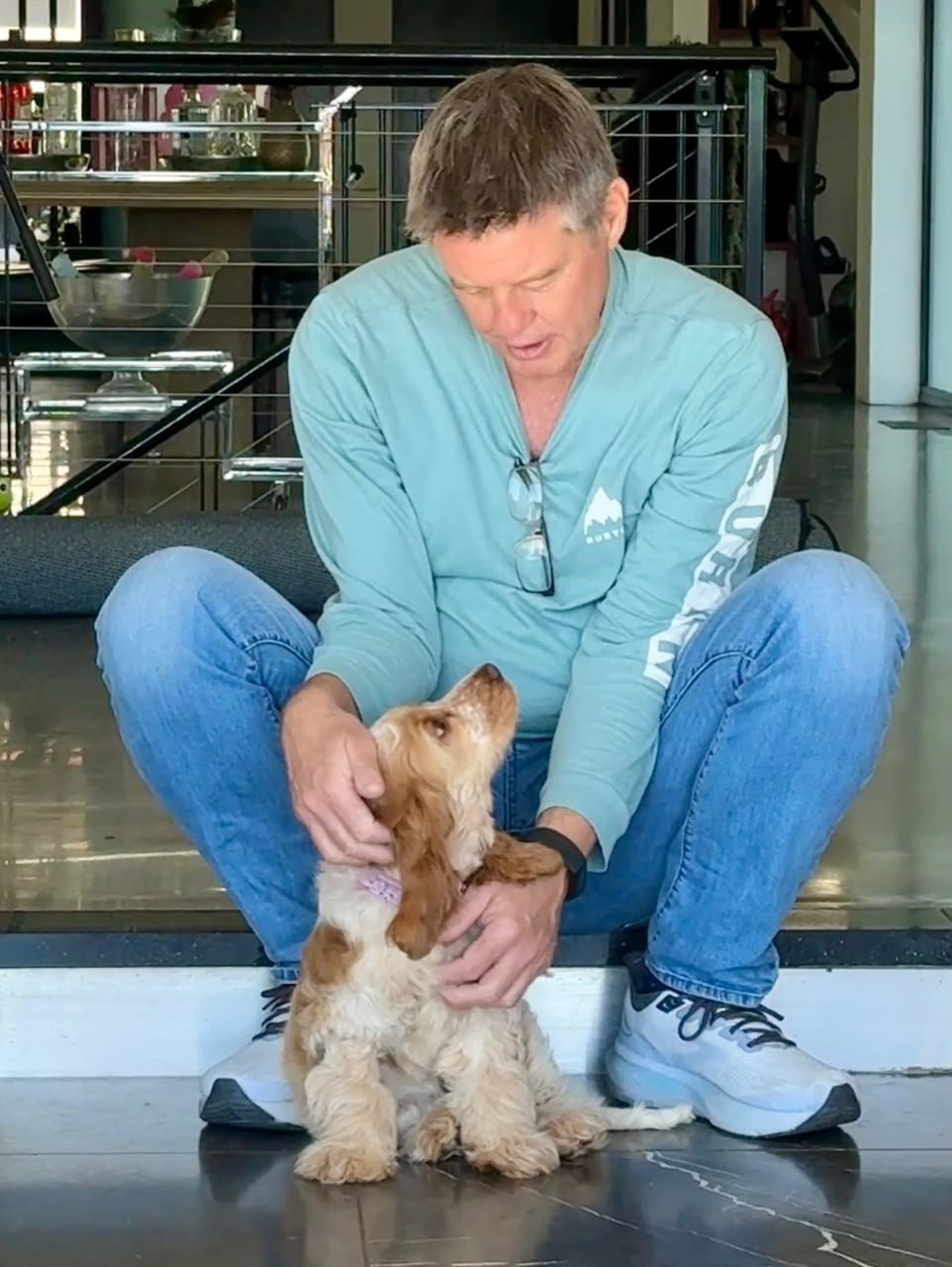 The Bennett family with their Cocker Spaniel puppy Cooper in Austin, Texas