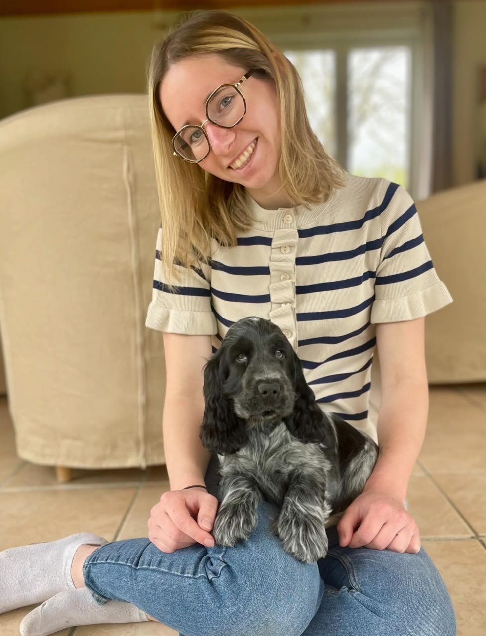 Maria Gonzalez with her Cocker Spaniel puppy Luna in Tampa, Florida